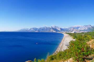 Naklejka premium wide Konyaaltı Beach and blue sea in Antalya, Turkey. Aerial landscape