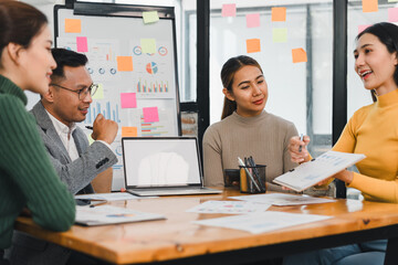 diverse team discussing business strategies in meeting
