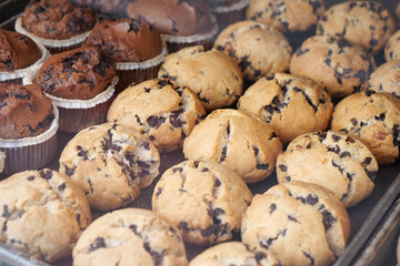 A display of incredibly delicious Chocolate Chip Muffins and Cupcakes