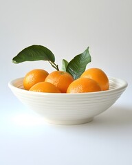 Fresh Oranges in a White Bowl with Green Leaves: A Still Life of Citrus Fruit, Healthy Eating, and Vibrant Colors,  Perfect for Recipes and Inspiration.