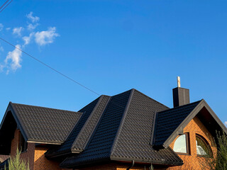 A metal tile roof landscape that is ideal for any climate due to its durable finish