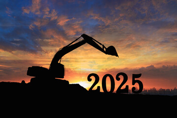 Concept happy new year 2025,crawler excavator silhouette with lift up bucket .On sunset  backgrounds