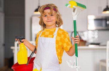 Portrait of child helping with housework, cleaning the house. Housekeeping, home chores.