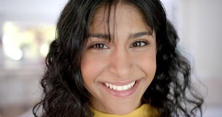 Obraz premium Portrait of happy biracial female teenager with long hair at home