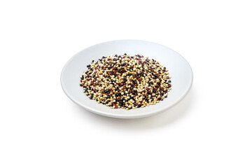 Organic Tri-color Quinoa (Mixed Quinoa) placed on a white plate isolated on white background. Quinoa is a round seed that is high in protein, high in energy, and rich in high fiber.