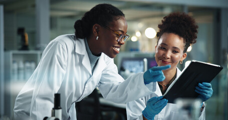 Science, women and tablet in lab for advice, positive feedback or pointing with problem solving at...