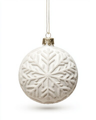 Fototapeta premium Elegant white Christmas ornament with snowflake design hanging.
