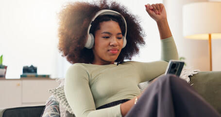 Headphones, phone and woman with music in home, hip hop and streaming subscription for audio....