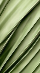 Obraz premium A green fabric with a pattern of lines and dots