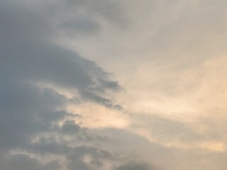 Blue sky with clouds and sunlight in a dramatic cloudscape