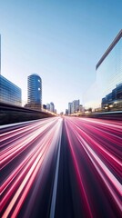 Blurred Motion of Downtown City Traffic and Skyscrapers at Night