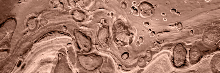 The texture of marble. Abstract background, made in the technique of fluid art. Demonstrating the...