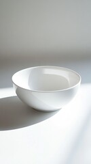 Fototapeta premium A Single White Ceramic Bowl on White Background