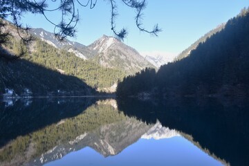 landscape of mirror lake at Jiuzhaigou natural national park travel location in China 