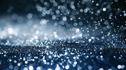 A shimmering abstract background with sparkling bokeh effects.