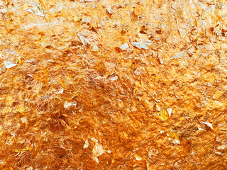 Texture of the gold leaf, Gold background, Picture from Buddha image Back