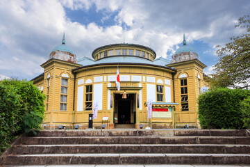 Meiji-mura open air architectural museum preserves historic buildings between 1867-1989, shows UJI-YAMADA post office.