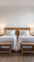 Cozy bedroom with twin beds and warm wooden accents in a serene setting