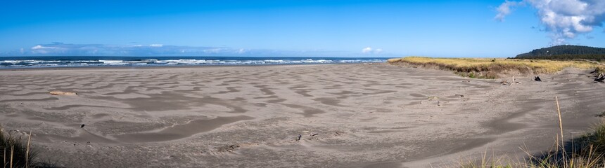 Panorama of the drifting sands of Benson Beach in the autumn sun at Cape Disappointment State Park in Ilwaco, Washington, USA