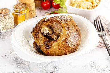 Baked pork knee with spices