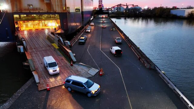 Aerial Timelapse of New Cars Being Unloaded from Vehicle Car Carrier Ship
