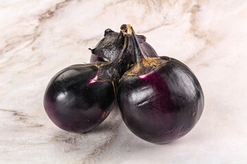 Raw violet and black eggplant