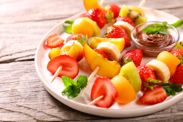 skewer fruits and chocolate sauce