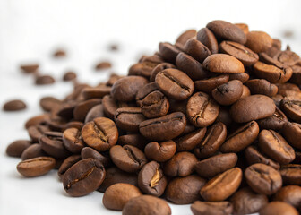 Fototapeta premium Pile coffee beans on white background.