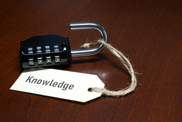 unlock knowledge, open padlock with tag