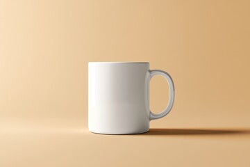 White mug on beige background. Perfect for mockups, branding, or product designs.