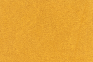 Yellow color abstract textile pattern for background. Close-up macro photography table top view of yellow colour surface level fabric material, colored background texture of cloth for design element