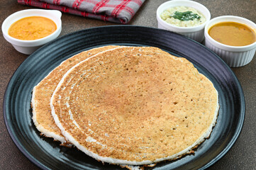 Kal Dosai south indian breakfast dish served in a plate.