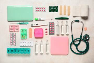 Medical supplies with stethoscope, thermometer and injections on white background. Top view