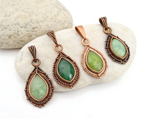 four-rustic-copper-and-green-gemstone-pendants-