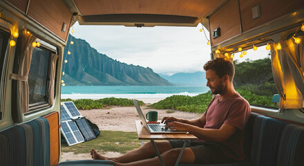 Camper Van Productivity. Young man sitting camper van parked at a scenic beach focused on his laptop.