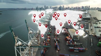 Aerial of commercial port with crane and container with animated pin map showing location all around the globe for worldwide international shipping