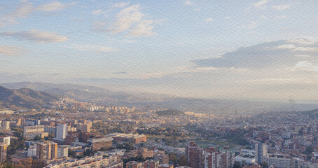 Fototapeta premium Cityscape with a cloudy sky and a mountain in the background