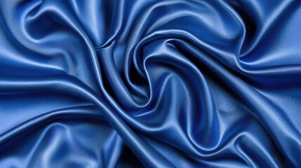 Fototapeta premium Elegant deep blue satin fabric texture background.