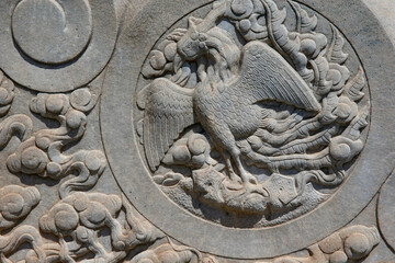 Vintage ornament on the stone. Close-up seamless texture. Stone texture. Embossed pattern.