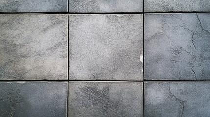 Naklejka premium Minimalistic concrete patio tiles with a neutral gray hue, textured finish for modern outdoor aesthetics