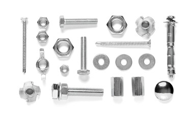 Arrangement of different tap bolts, screws and chrome nuts isolated on white background