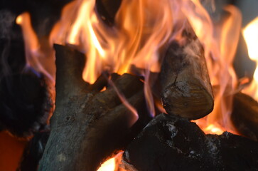 A closeup shot of a burning fire at a cold night for heating purposes.