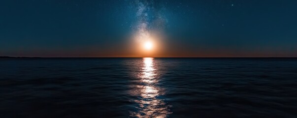 Fototapeta premium 海に映る美しい月明かりと星空の風景