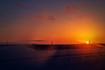 Nearby, Novoportovskoye oil and gas condensate field is northernmost and one of largest oil and gas condensate fields being developed on Yamal Peninsula. Tundra border with forest and sunset