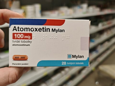 Prague,Czech Republic-August 7 2024: ATOMOXETIN MYLAN box of medication with ATOMOXETINE active substance by MYLAN,used for treatment of ADHD.	
