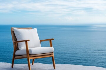 Fototapeta premium seaside retreat, rattan chair by azure water, gentle sea breeze, ideal for serene contemplation