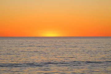 Sunset at the sea with orange sky, background (Jurien Bay, Australia)