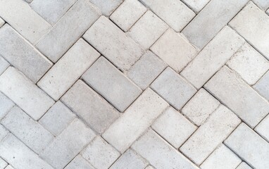 Obraz premium コンクリートのタイルが交差する美しいパターンのテクスチャ