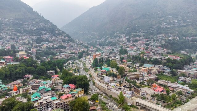 Aerial view of himalayan mountains at kasol himachal pradesh. Small villages and colorful local houses nested in the hills of parvati valley at kasol, himachal pradesh, India.