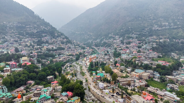 Aerial view of himalayan mountains at kasol himachal pradesh. Small villages and colorful local houses nested in the hills of parvati valley at kasol, himachal pradesh, India.